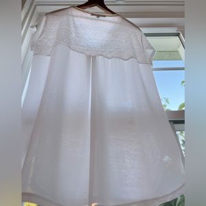 White, oversized t-shirt.  Sheer in back.